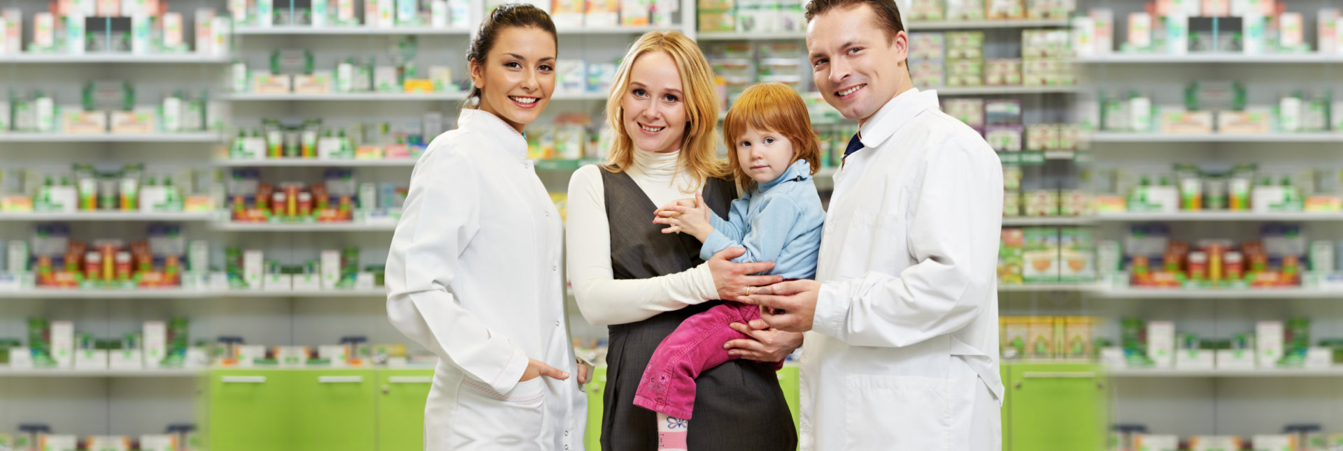 Pharmacists, mother and child at pharmacy