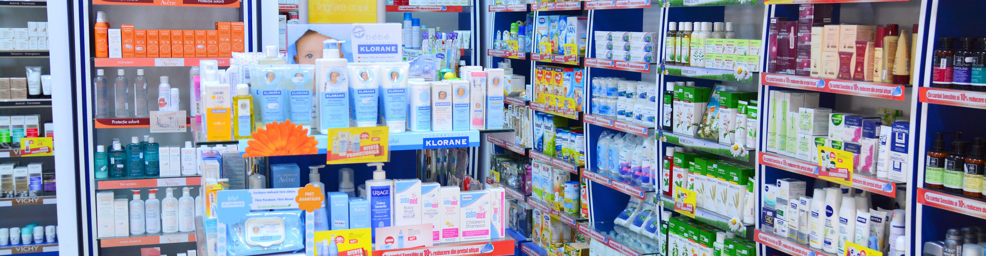 pharmacy shelves full of products on display